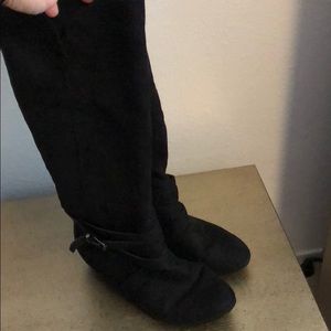 Black heeled knee high boots
